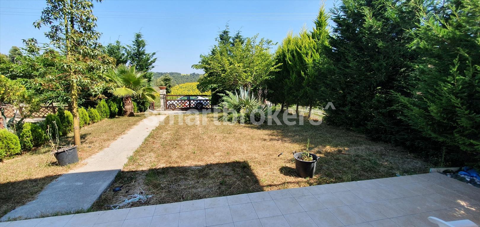 The house with its own yard located in a gated complex in the area of the town of Sani in Kassandra (Halkidiki)